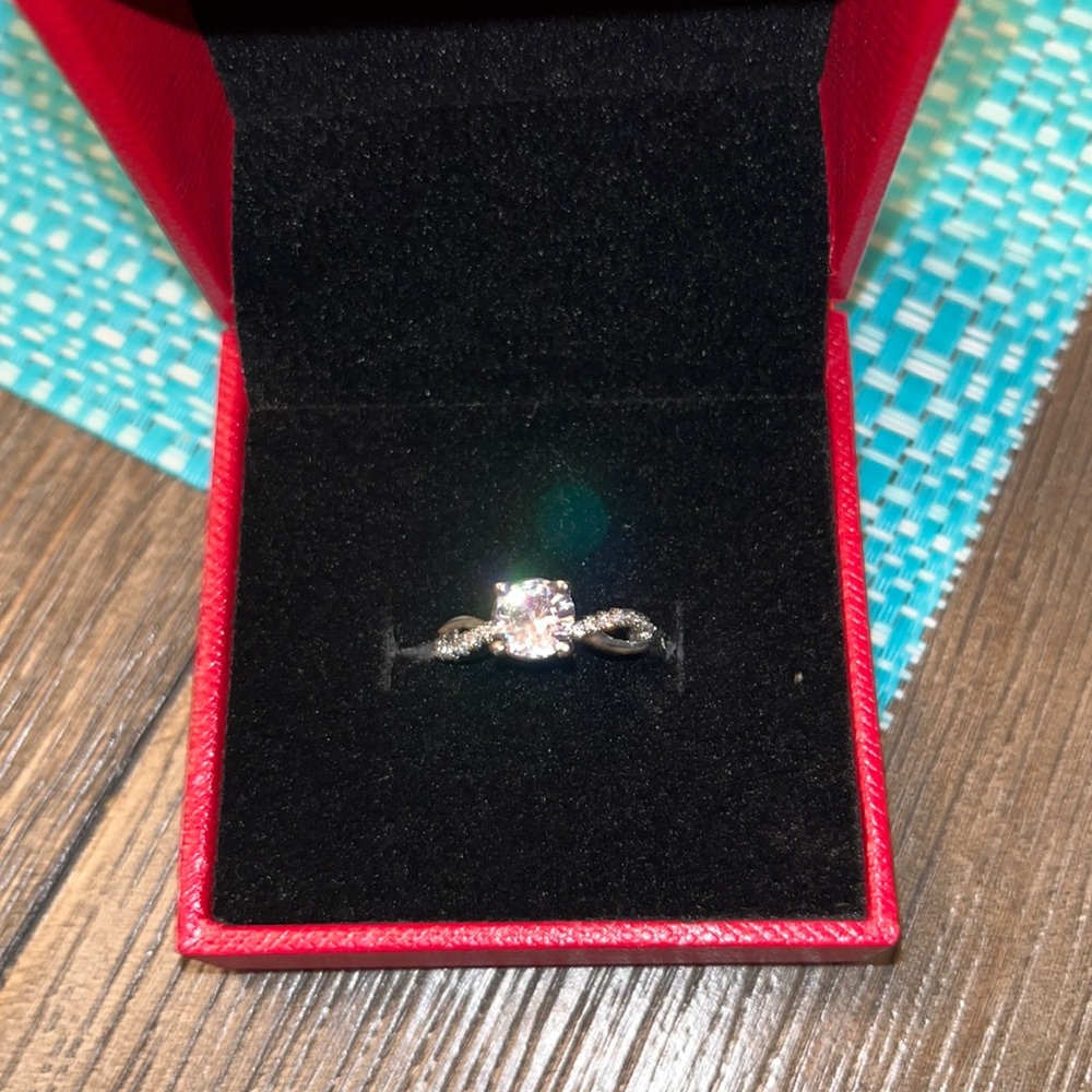 1C Moissanite Ring- never before worn brand new in box with certified paperwork